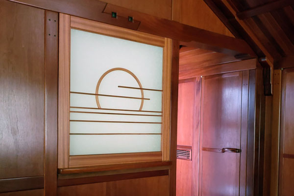 Shoji panel cover back-lite to create elegant room lighting.