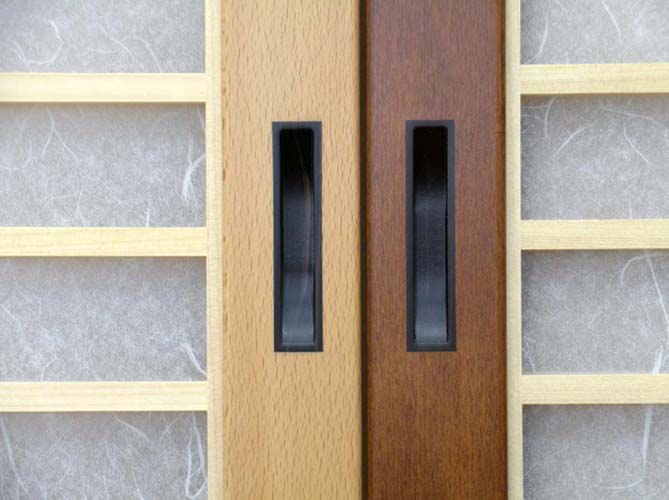 Inlaid Ebony door pulls in natural Beech and stained Beech