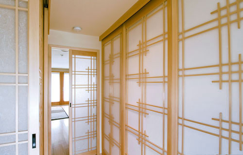 Fixed shoji screen panels line the hallway