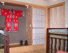 Sliding shoji closet door next to tokonoma