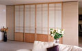 These tall shoji screens show a prairie style influence in the kumiko pattern.